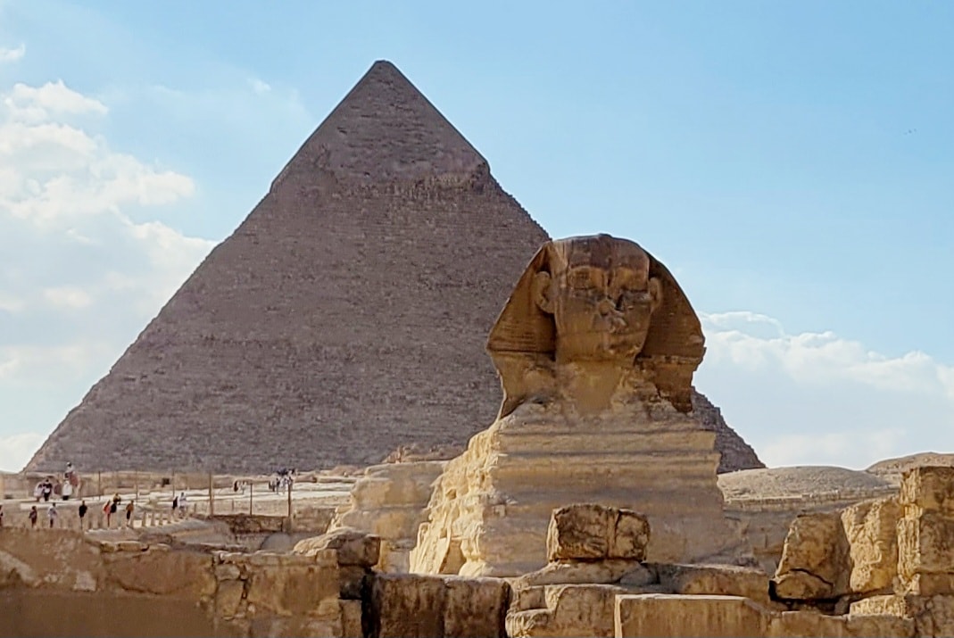 The Great Sphinx with the Pyramid of Khafre rising behind it
